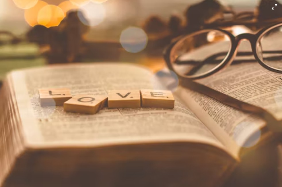 glasses lying on book